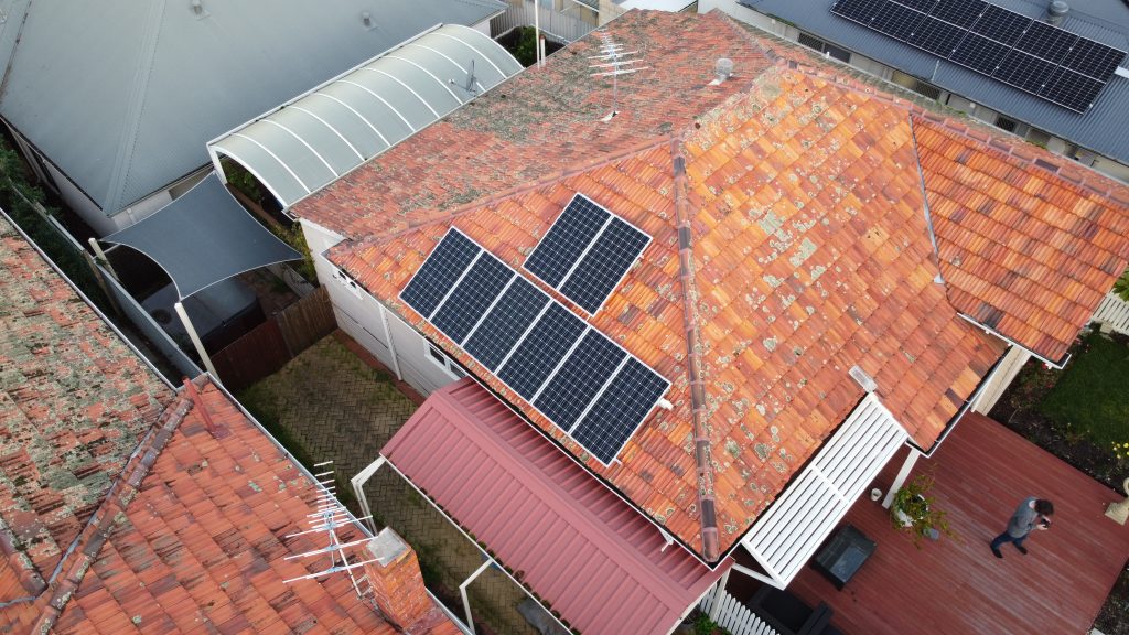 Orange roof with solar panels installed
